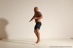 Underwear Man Black Muscular Bald Dancing Dynamic poses Academic